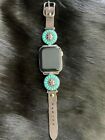 Brown leather Apple Watch Band w/ Turquoise accents.