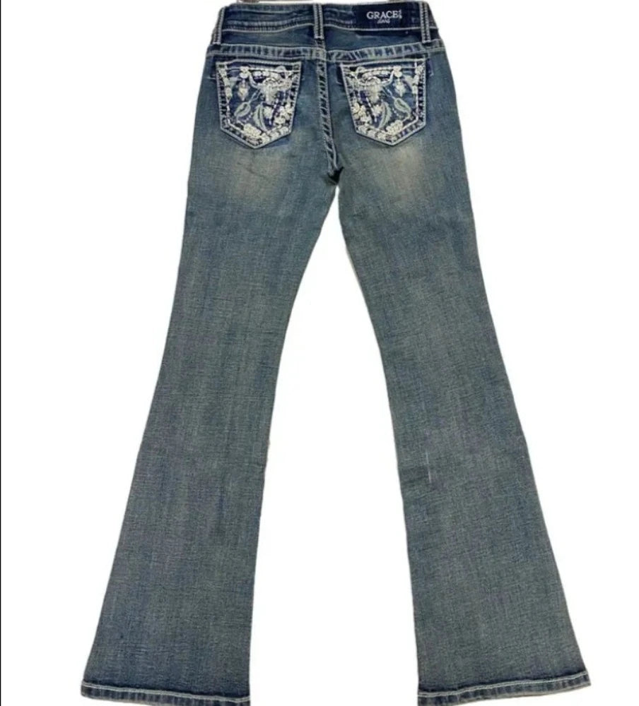 Grace in L.A Whimsical Cow Head Boot Cut Jeans